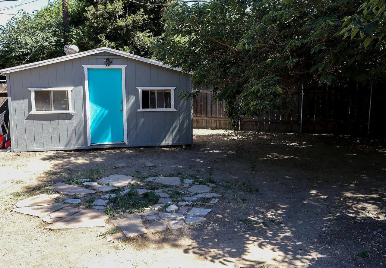 The big backyard under mature trees